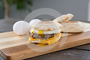 Sausage, Egg and Cheese Breakfast Sandwich with Yoke