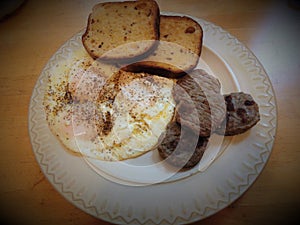 Sausage, egg, and toast breakfast