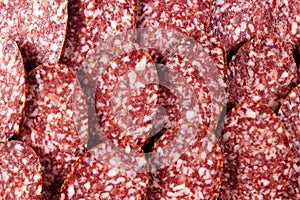 Sausage food background. A popular snack-minced meat in an oblong shell, contains several types of meat, fillers, subjected to