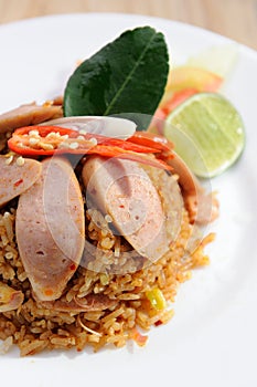 Sausage fried rice on white dish