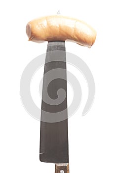 Sausage on a kitchen knife isolated on white background