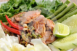 Sausage Larb on white dish