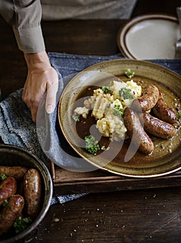 Sausage and mash potato on plate