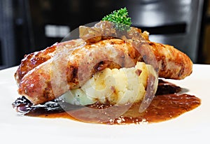 Sausage with mash potato photo