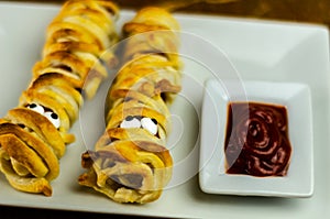 Sausage mummies in dough scary halloween food celebration party