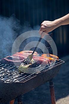 Sausage and peppers on grill