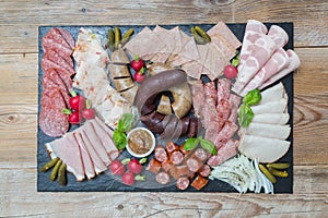 Sausage plate variation on a wooden table