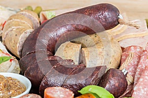 Sausage plate variation on a wooden table