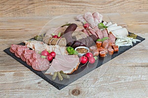 Sausage plate variation on a wooden table