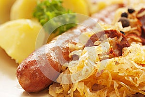 Sausage with potatoes and sauerkraut