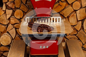 Sausage on red scales