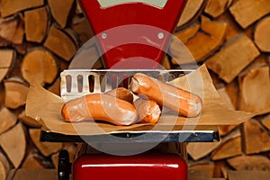 Sausage on red scales