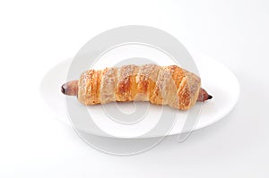 Sausage roll bread on plate on white background