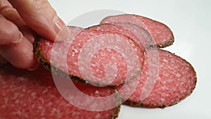 sausage salami hands a white background