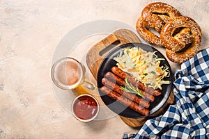 Sausage, sauerkraut, bretzels and beer.