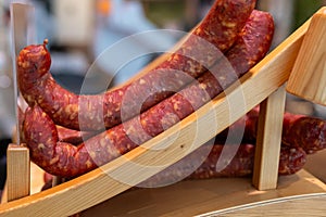 sausage on a wooden shelf