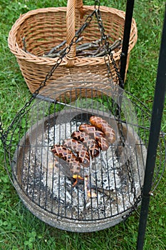 Sausages being barbequed