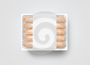Sausages in blank white plastic disposable box mockup, isolated,
