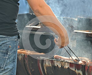 Sausages on a charcoal grill