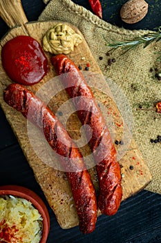 Sausages with cheese fried with spices and herbs