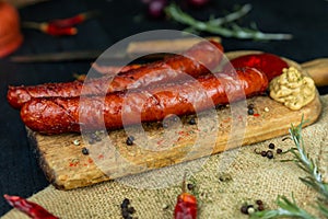 Sausages with cheese fried with spices and herbs