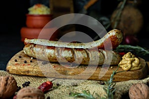 Sausages with cheese fried with spices and herbs