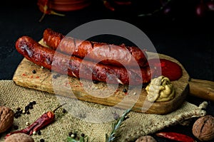 Sausages with cheese fried with spices and herbs