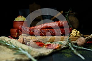 Sausages with cheese fried with spices and herbs