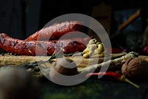 Sausages with cheese fried with spices and herbs