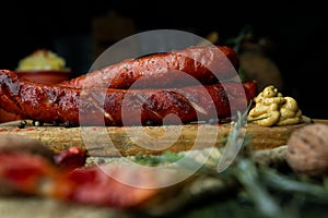 Sausages with cheese fried with spices and herbs