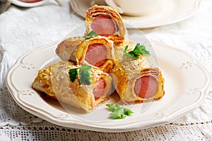Sausages with cheese in lavash for a breackfast