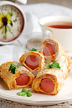 Sausages with cheese in lavash for a breackfast