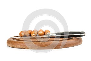 sausages on chopping board on isolated on white background