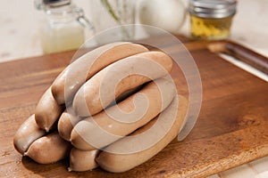 Sausages on cutting board