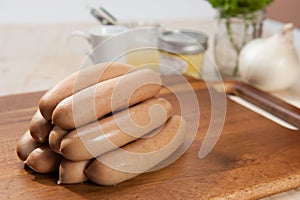 Sausages on cutting board
