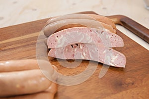 Sausages on cutting board