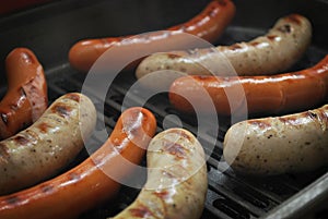 Sausages on electric grill
