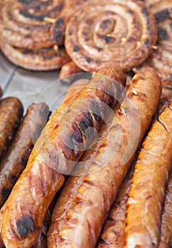 Sausages grilled on a barbecue