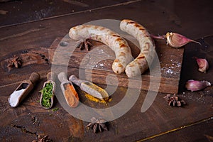 Sausages grilled food background, wood background.