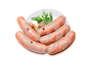 Sausages for grilling, dill and parsley isolated on white background