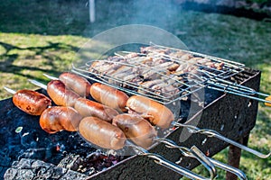 sausages barbecue picnic on the nature brazier