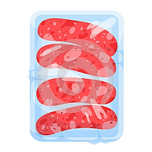 Sausages in plastic tray, portion of frozen or fresh cold delicatessen meat sausages