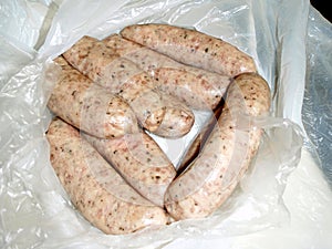 Sausages raw in bag as bought.