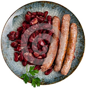 Sausages with red beans, typical Catalan dish butifarra con alubias photo