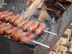 Sausages roasted on charcoal