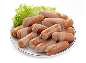 Sausages on a white dish