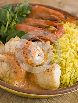 Saute of Monkfish Prawns and Rice with Pimento