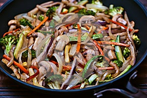 Sauted Chopped Vegetables in Juliana: Zucchini, Onions, Eggplant, Carrots, Mushrooms and Broccoli photo