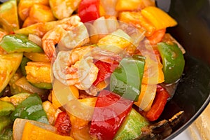 Sauted mixed vegetables and shrimp with tomato sauce photo
