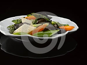 Sauteed Asparagus with Chinese Yam and Black Fungus served dish isolated on background top view food